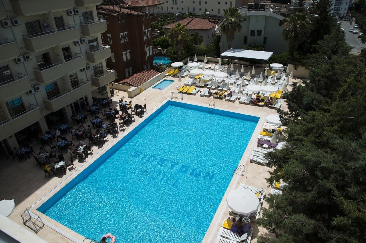 Sunbeach Hill Hotel Side Exterior photo
